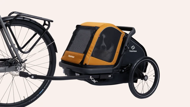 smart storage for the bicycle arm of the bike trailer in stroller mode