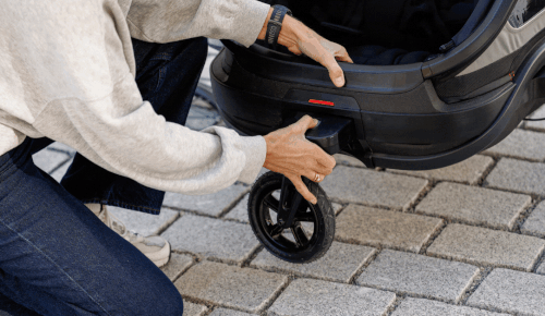 smart storage solution for the stroller wheel when using the trailer in bike mode